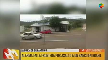 Brasil: roban un banco con auto argentino y llevan a uno de los rehenes sobre el capot